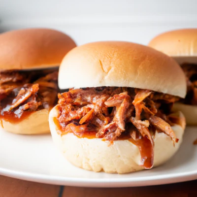 A plate of Indoor Pulled Pork with Homemade Barbecue Sauce.