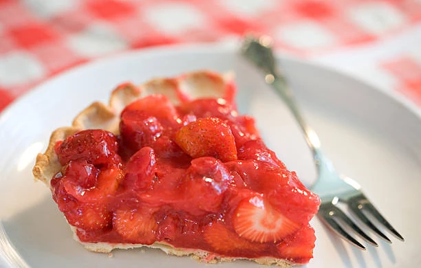 A slice of strawberry pie